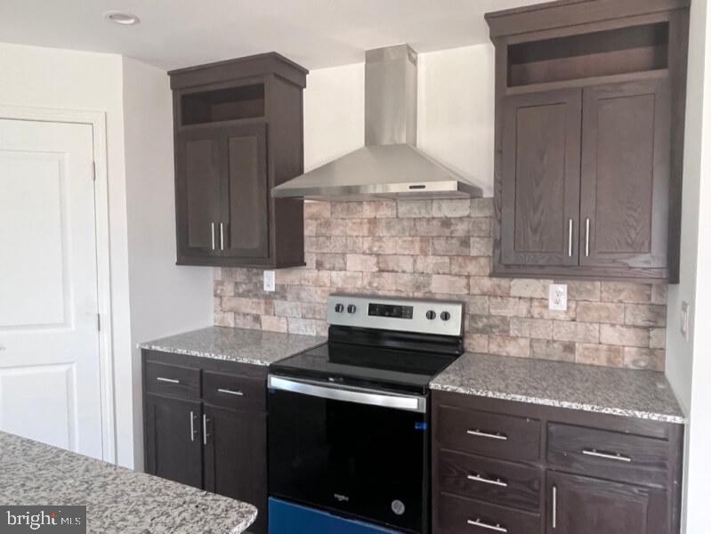 136 Minch Road Parkesburg, PA 19365 - Photo 11 of 17 a kitchen with stainless steel appliances granite countertop a stove and a sink