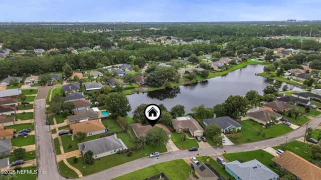 a view of a lake with a building in the background