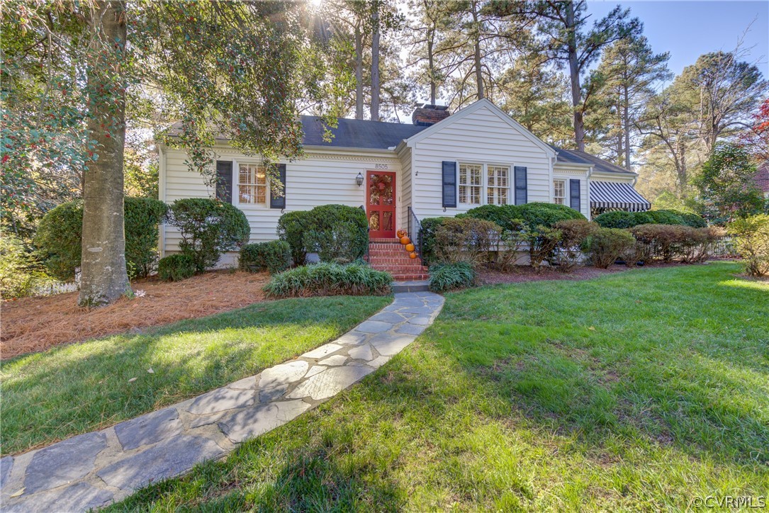 8505 Julian Road Henrico, VA 23229 - Photo 1 of 44 a front view of a house with yard and green space