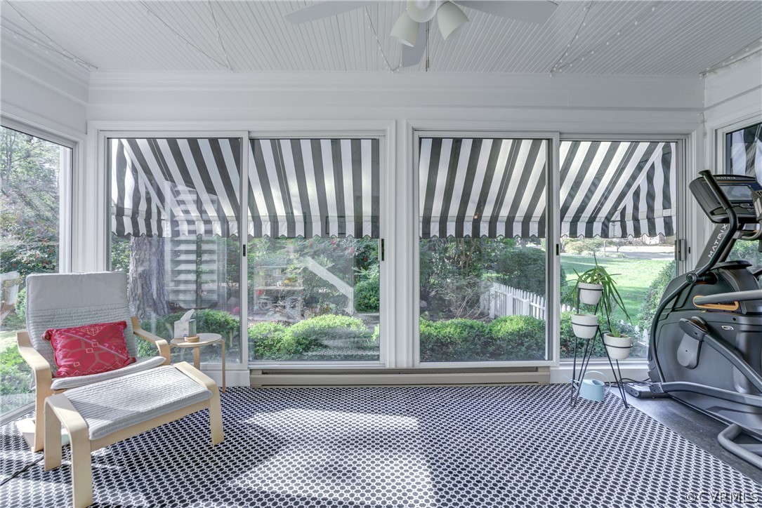 8505 Julian Road Henrico, VA 23229 - Photo 12 of 44 a living room filled with furniture and a floor to ceiling window