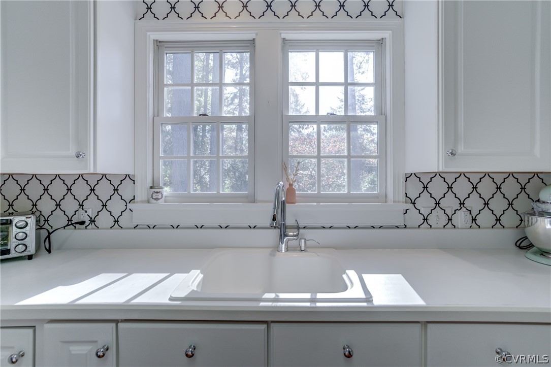 8505 Julian Road Henrico, VA 23229 - Photo 17 of 44 a view of a kitchen with a sink and dishwasher