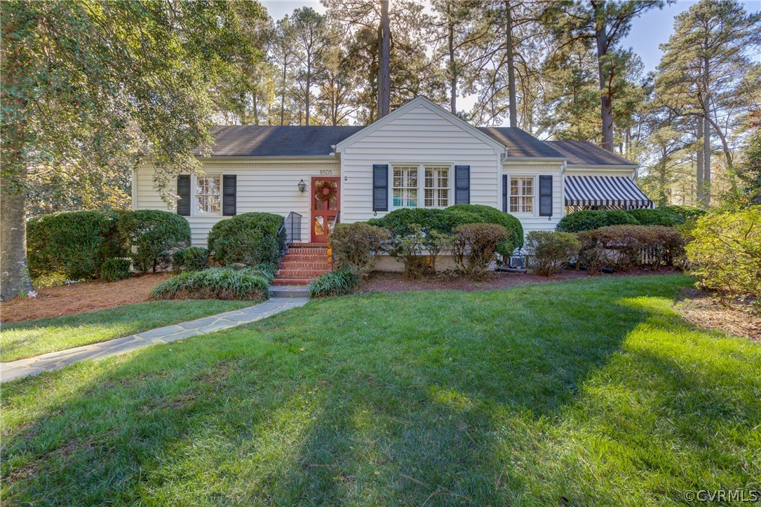 8505 Julian Road Henrico, VA 23229 - Photo 2 of 44 a front view of a house with a yard and green space