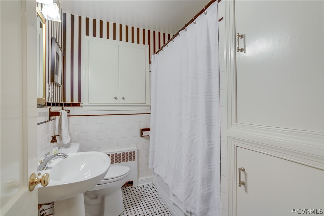 8505 Julian Road Henrico, VA 23229 - Photo 23 of 44 a bathroom with a sink and a mirror