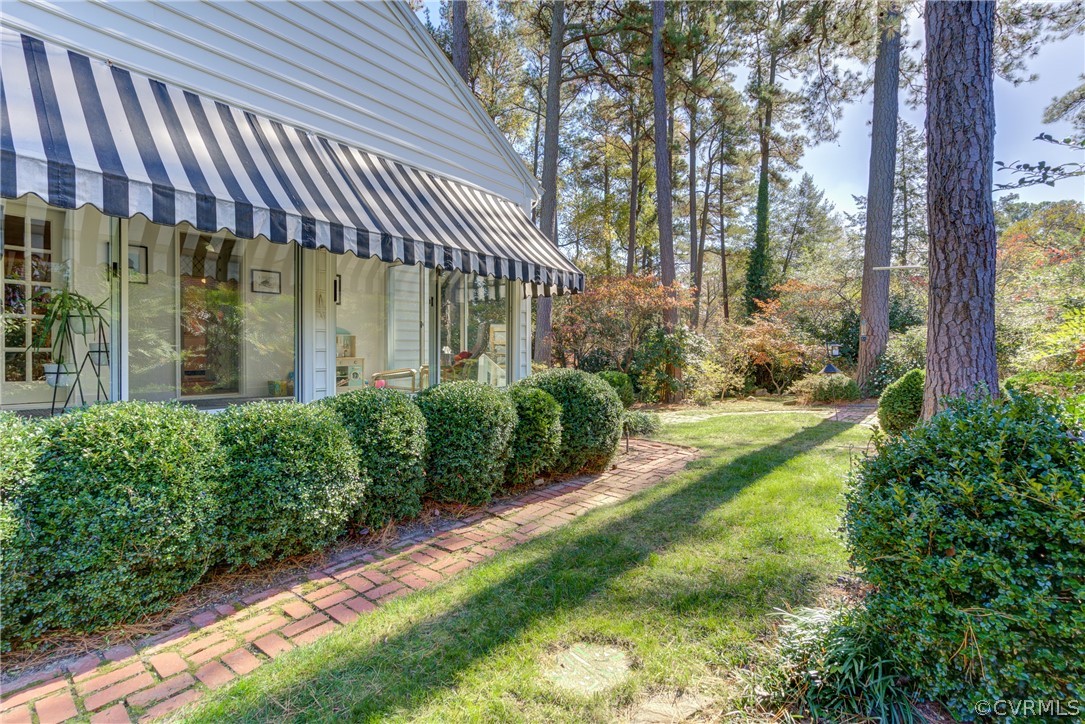8505 Julian Road Henrico, VA 23229 - Photo 38 of 44 a view of a house with a yard and plants