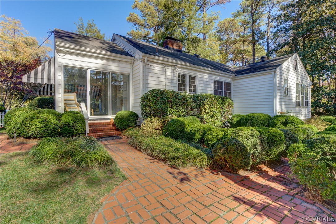8505 Julian Road Henrico, VA 23229 - Photo 39 of 44 a front view of a house with garden