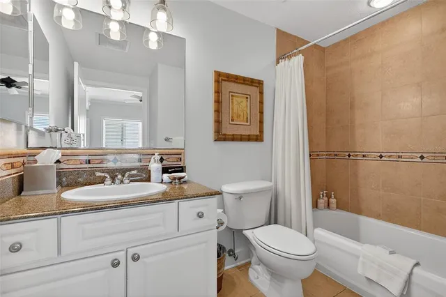 a view of a chairs and table in the patio