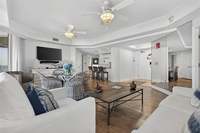 a view of a dining room with furniture and a window