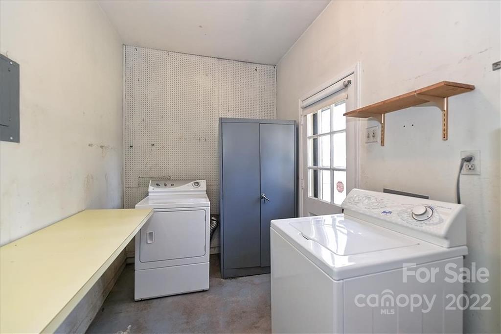 5714 Sharon Road Charlotte, NC 28210 - Photo 19 of 22 a utility room with dryer and washer