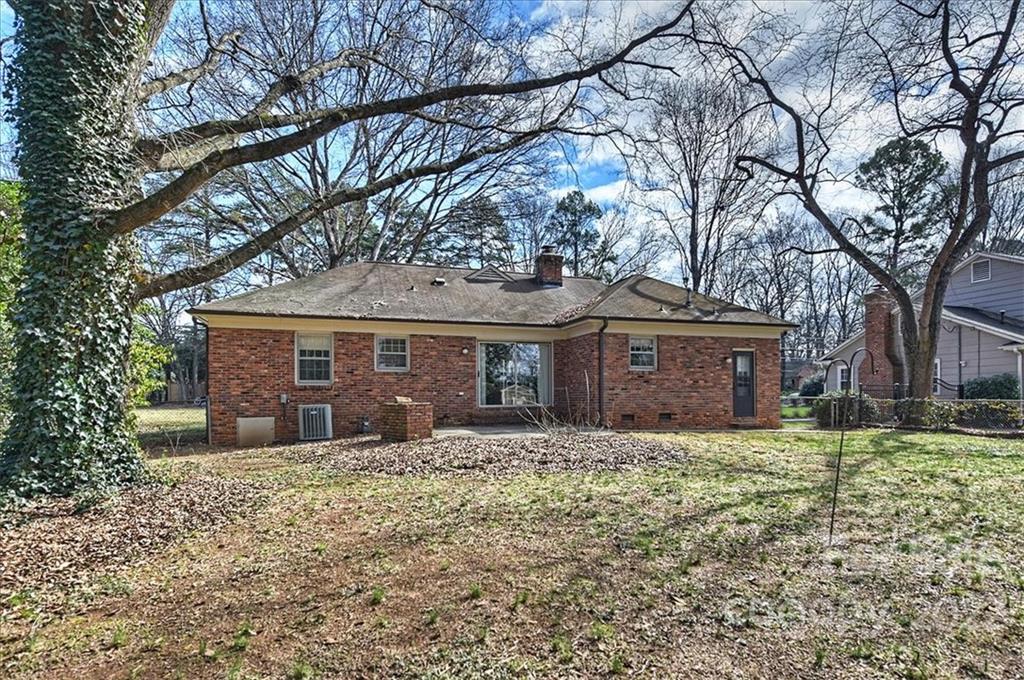 5714 Sharon Road Charlotte, NC 28210 - Photo 21 of 22 a front view of house with yard