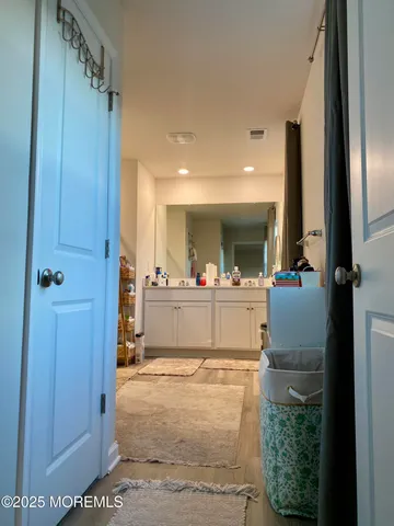 a view of living room with furniture and a flat screen tv