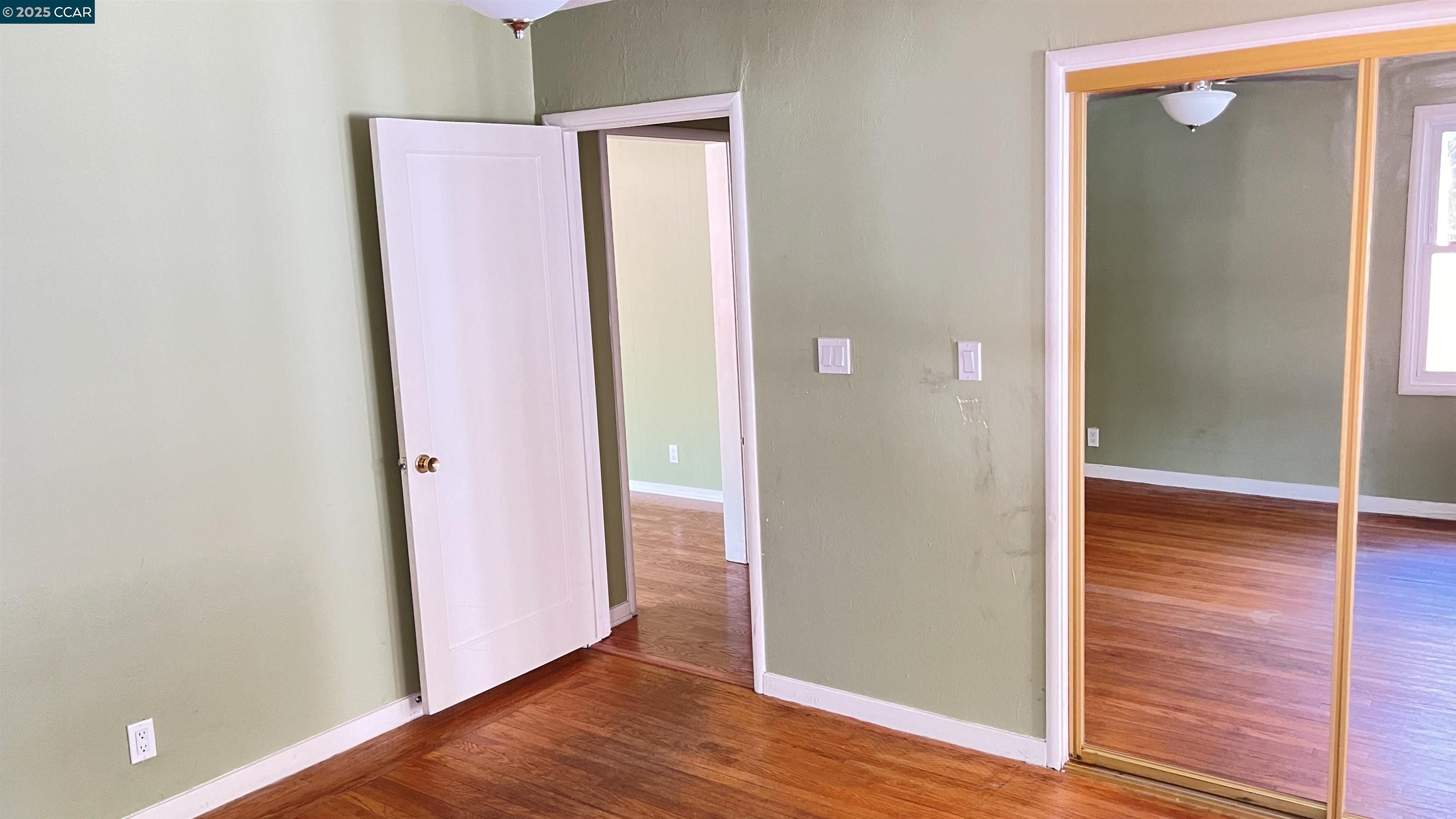 3655 Granzotto Drive Concord, CA 94519 - Photo 14 of 22 an empty room with wooden floor and closet
