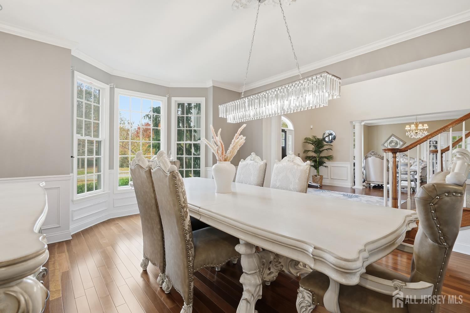12 Risa Benjamin Way Freehold, NJ 07728 - Photo 13 of 32 a view of a dining room with furniture and wooden floor