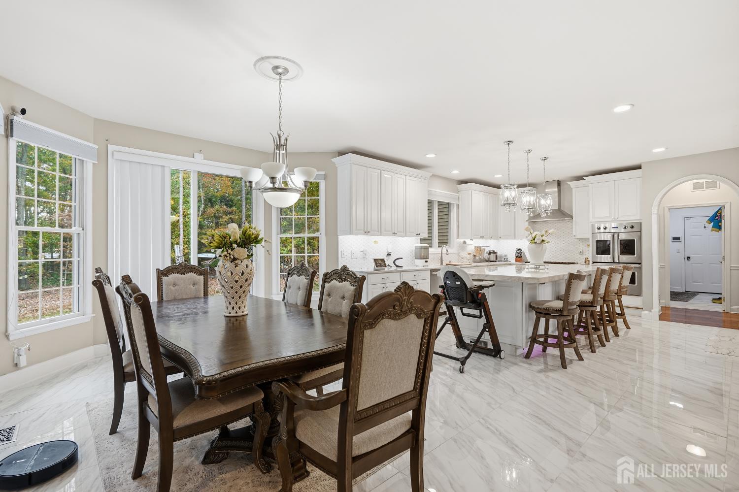 12 Risa Benjamin Way Freehold, NJ 07728 - Photo 14 of 32 a view of a dining room and livingroom view