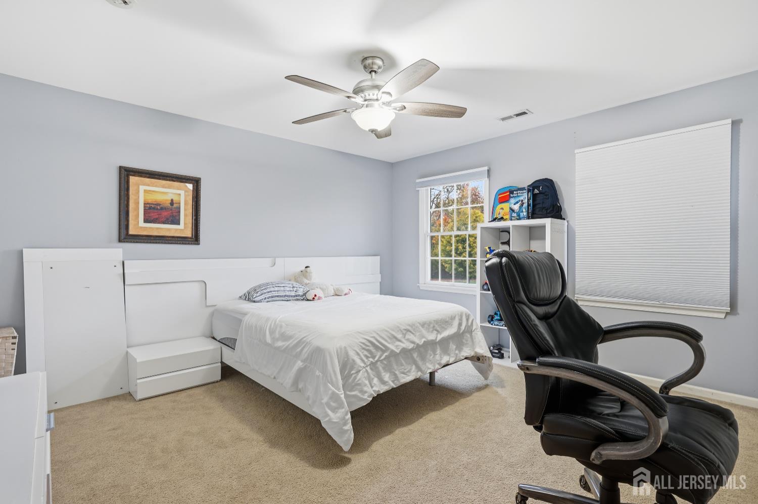 12 Risa Benjamin Way Freehold, NJ 07728 - Photo 20 of 32 a bedroom with a bed and a desk