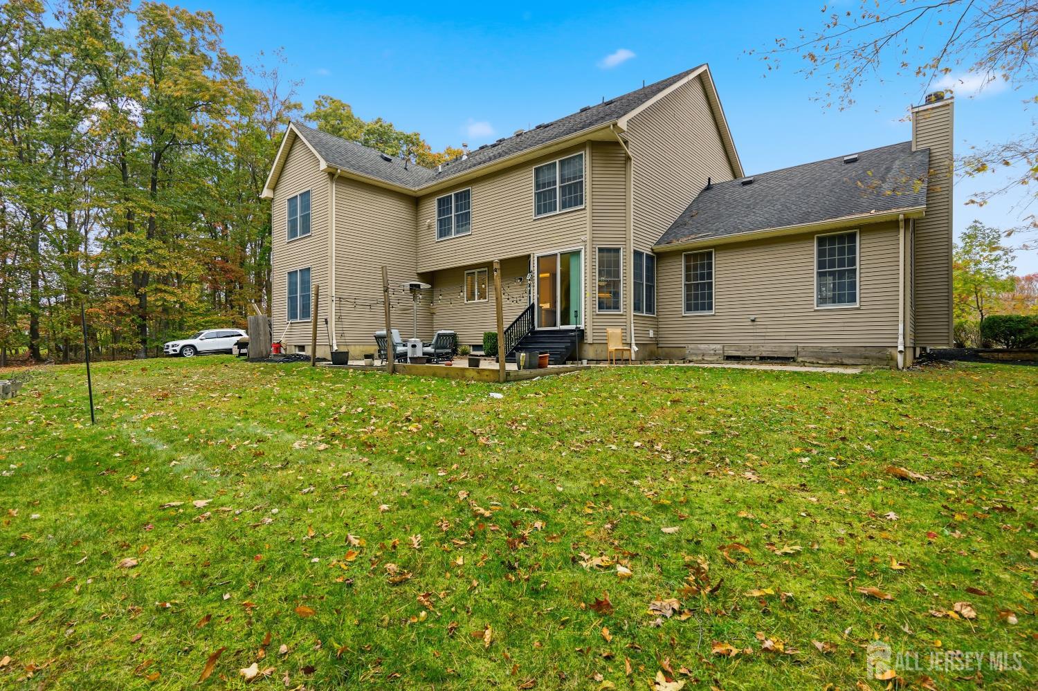 12 Risa Benjamin Way Freehold, NJ 07728 - Photo 31 of 32 a front view of a house with a yard