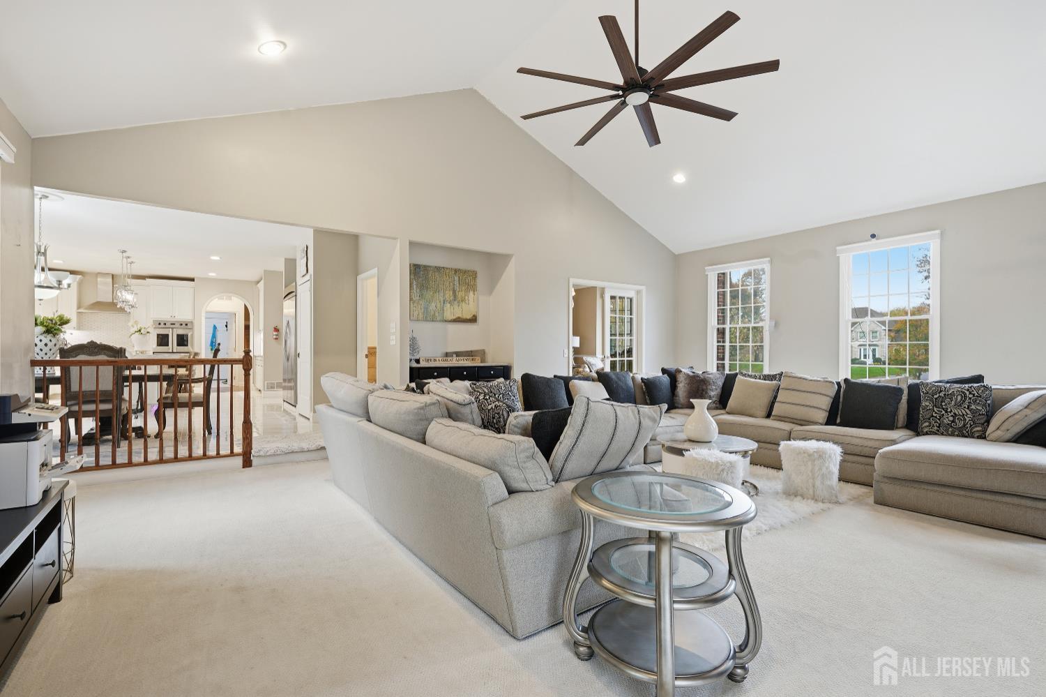 12 Risa Benjamin Way Freehold, NJ 07728 - Photo 9 of 32 a living room with furniture and a large window