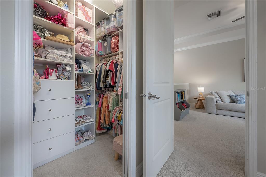3108 West Villa Rosa Street Tampa, FL 33611 - Photo 45 of 58 a view of walk in closet with clothes and shoes
