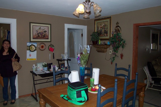 778 Spring Street Aurora, IL 60505 - Photo 13 of 16 a living room with furniture and a chandelier