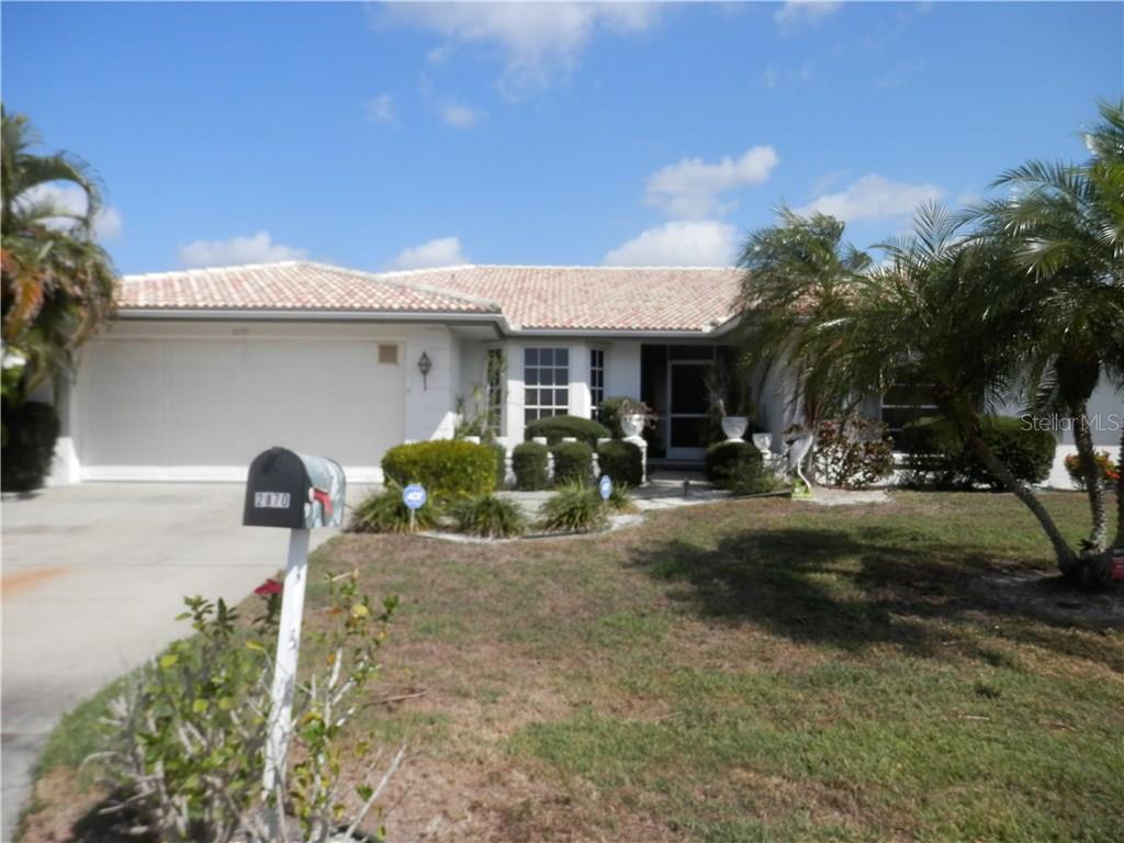 2170 Gulfview Road Punta Gorda, FL 33950 - Photo 1 of 1 a front view of a house with garden