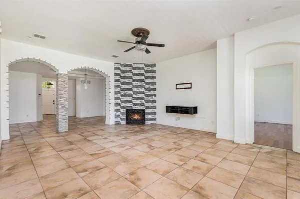 a view of a livingroom with a fireplace