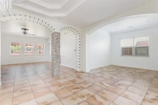 a view of an empty room and window