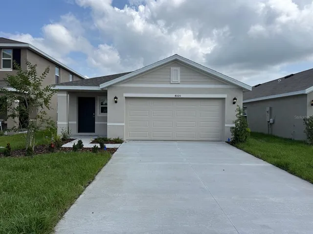 a front view of house with yard