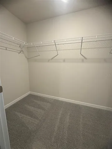 a view of a room with racks on the wall