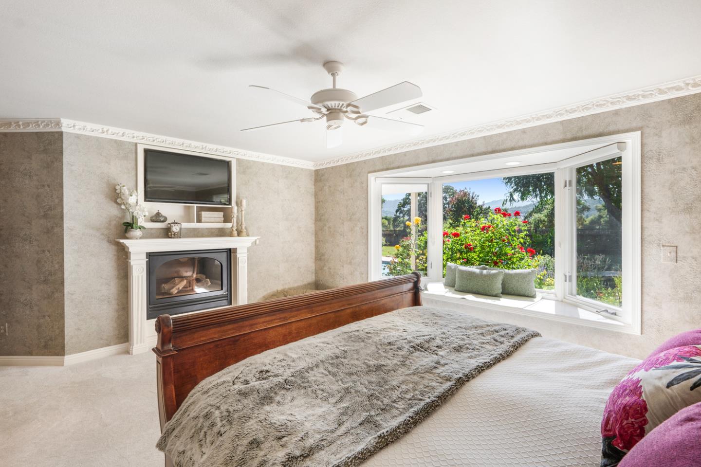 9230 Braquet Lane Gilroy, CA 95020 - Photo 17 of 49 a living room with a flat screen tv and a fireplace