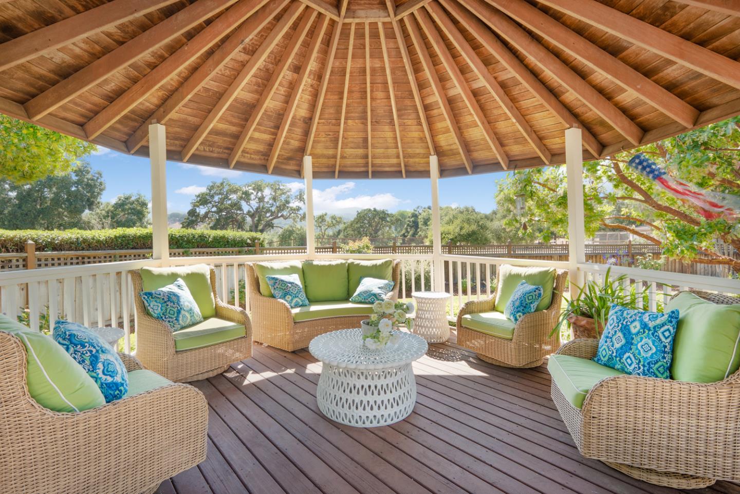 9230 Braquet Lane Gilroy, CA 95020 - Photo 26 of 49 a balcony with furniture and umbrella
