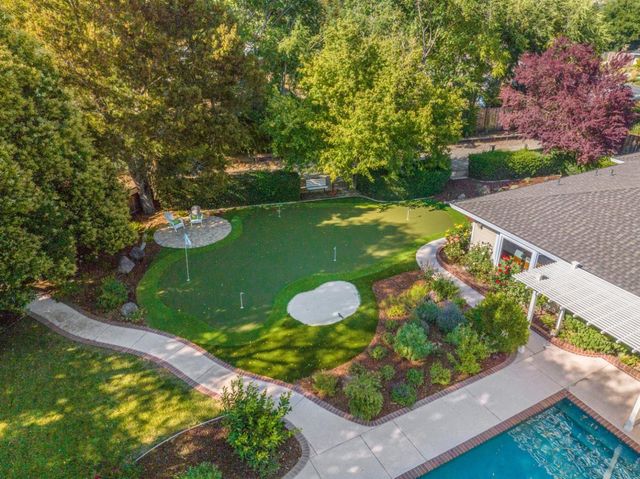 a view of a garden with an outdoor space