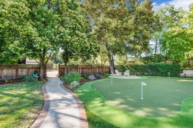 a backyard of a house with lots of green space