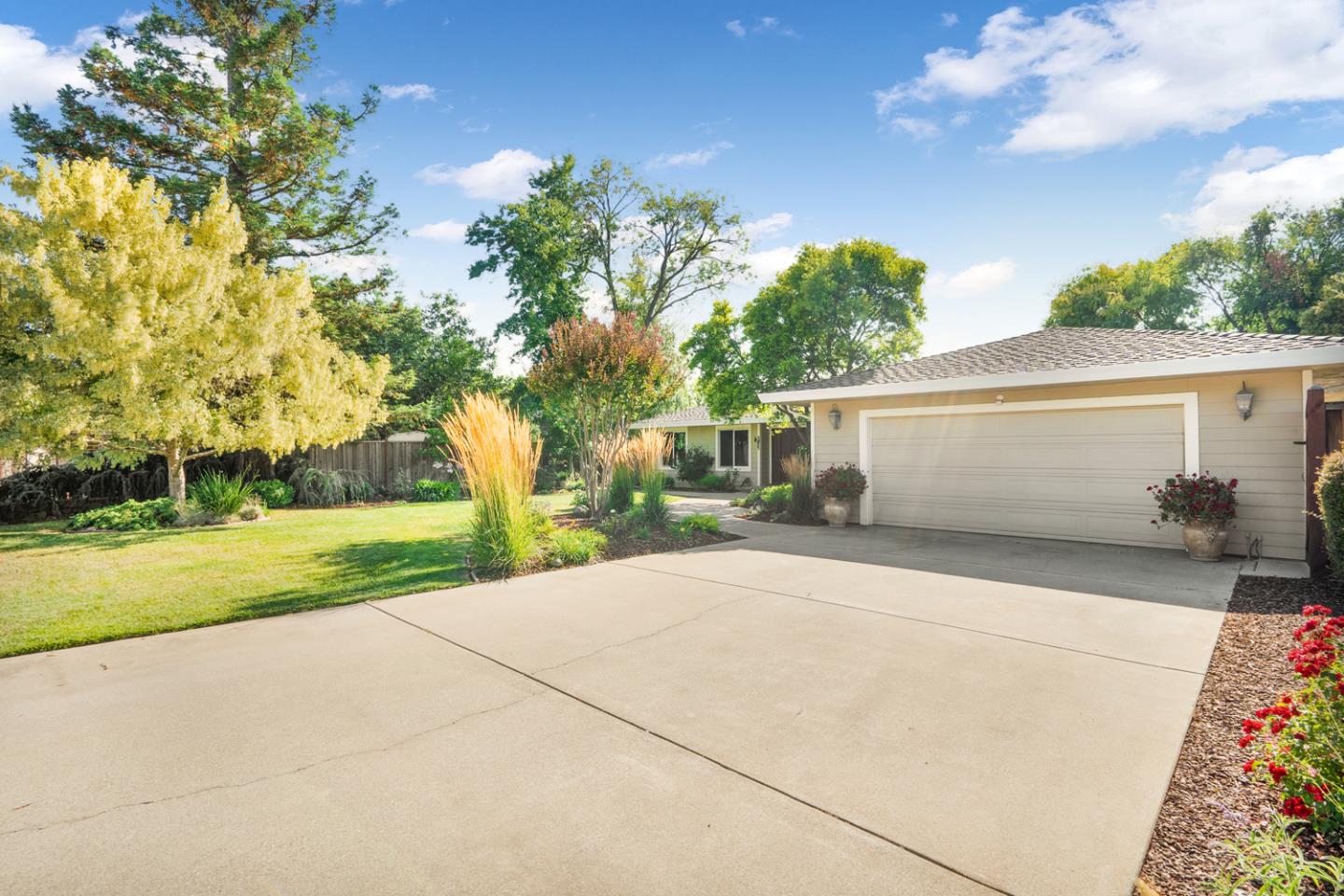 9230 Braquet Lane Gilroy, CA 95020 - Photo 47 of 49 front view of house with a yard and trees
