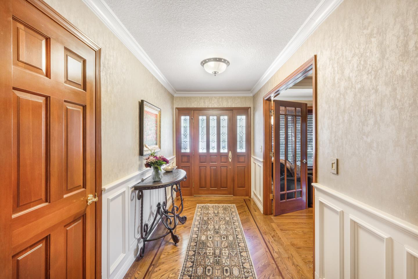 9230 Braquet Lane Gilroy, CA 95020 - Photo 7 of 49 a view of a hallway with furniture and floor to ceiling window
