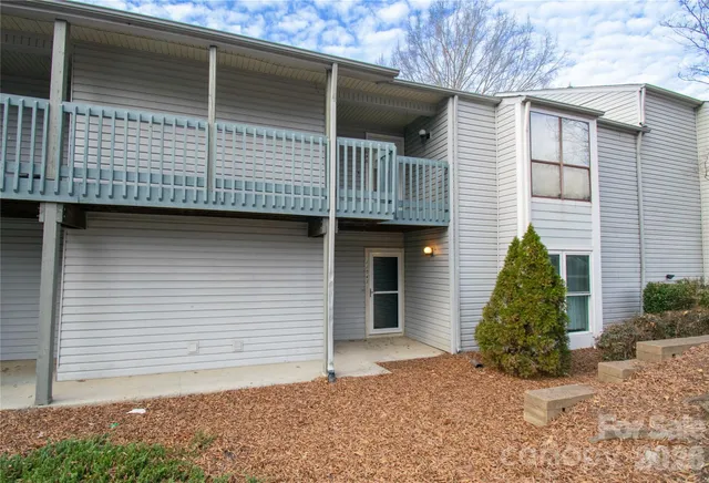 a front view of a house with garage