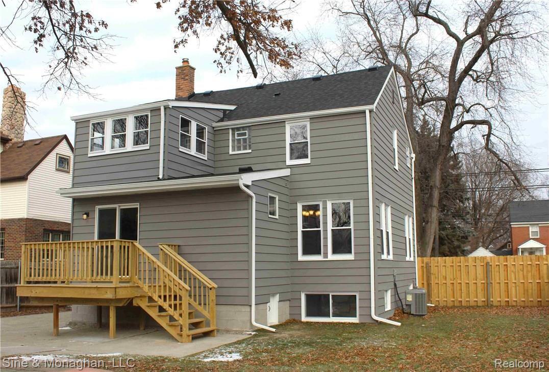 1527 Crooks Road Royal Oak, MI 48067 - Photo 3 of 19 Large fenced yard; doorwall in kitchen leads to deck.