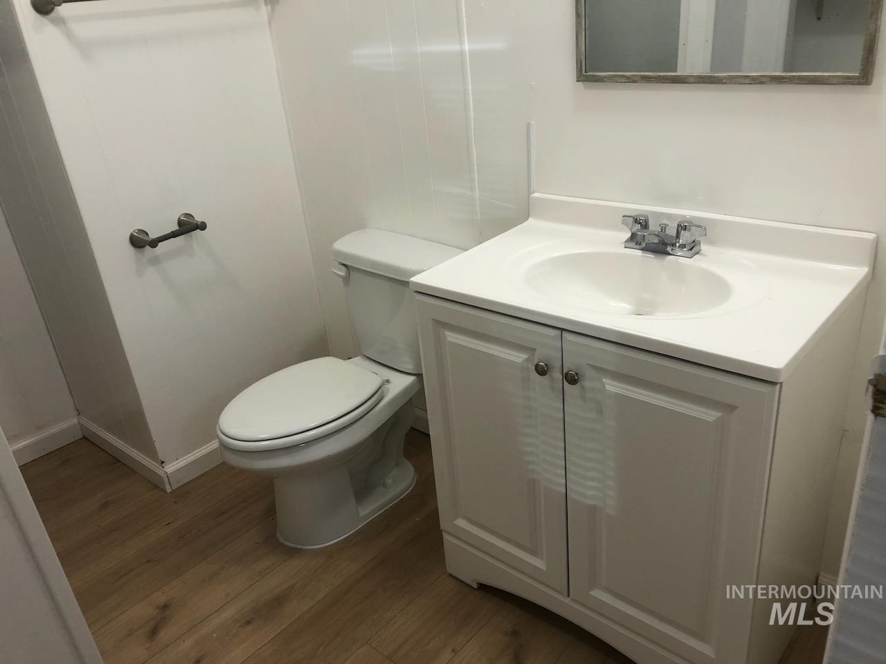 655 Dolson Lane Eagle, ID 83616 - Photo 21 of 23 Bathroom featuring vanity and dark wood finished floors