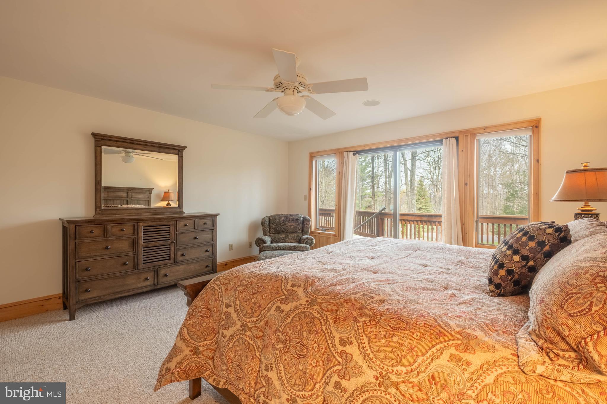 128 Bridgeview Lane Swanton, MD 21561 - Photo 17 of 70 a bedroom with a bed and a dresser