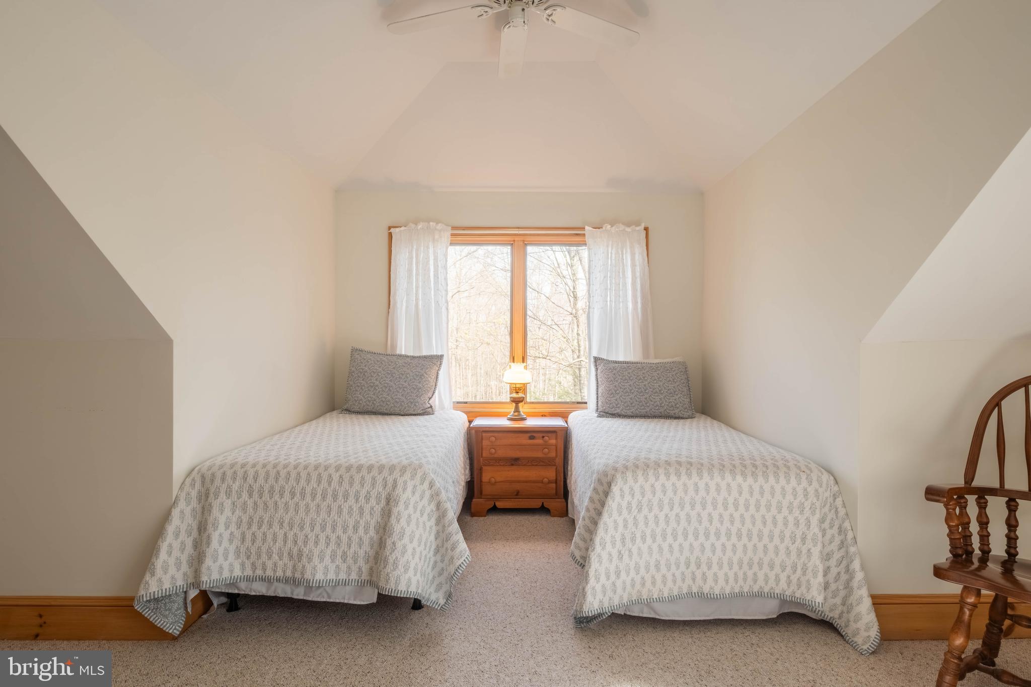128 Bridgeview Lane Swanton, MD 21561 - Photo 29 of 70 a bedroom with a bed and a couch