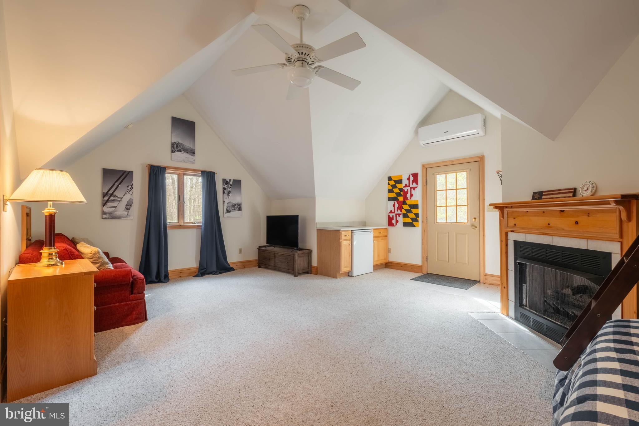 128 Bridgeview Lane Swanton, MD 21561 - Photo 43 of 70 a view of a livingroom with a fireplace and window