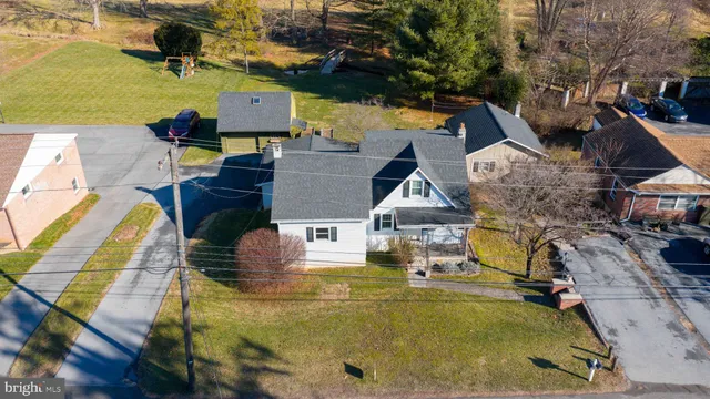swimming pool view with a outdoor seating space