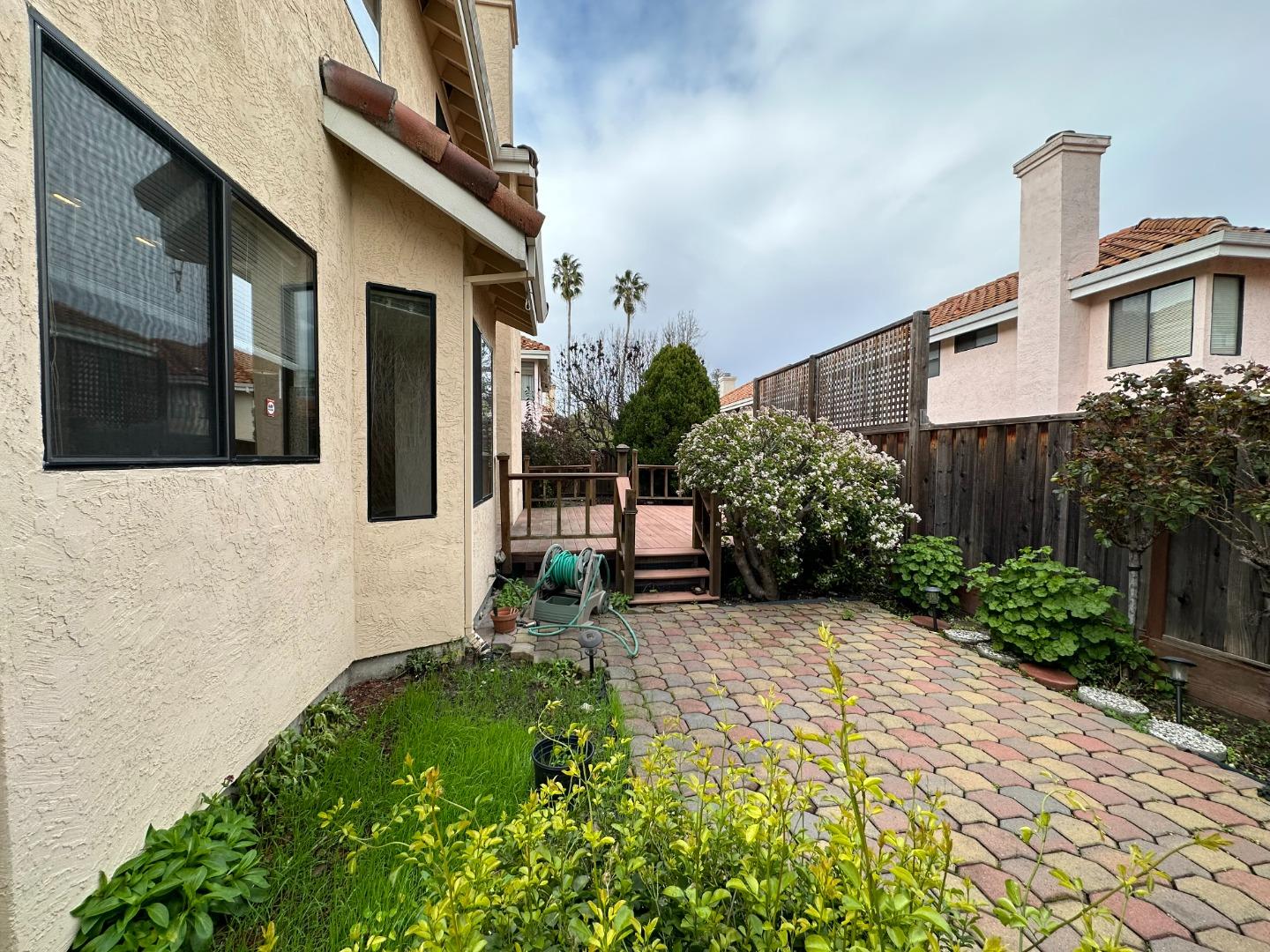 645 Kirby Common Fremont, CA 94539 - Photo 32 of 39 a view of a house with a yard and plants