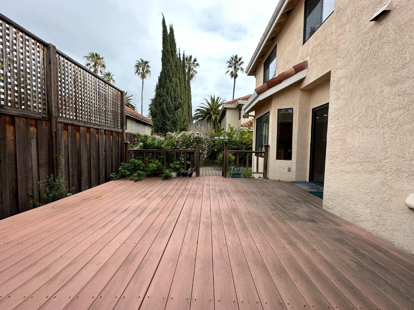 645 Kirby Common Fremont, CA 94539 - Photo 36 of 39 a view of backyard with a deck and wooden floor