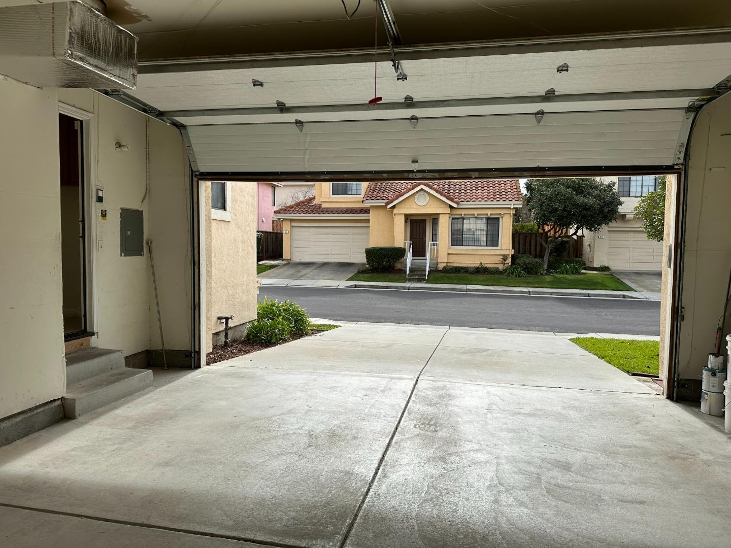 645 Kirby Common Fremont, CA 94539 - Photo 37 of 39 a front view of a house with a yard