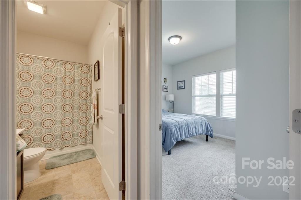 167 Old Carriage Road, Unit 226 Clover, SC 29710 - Photo 4 of 36 a bedroom with a bed and a window