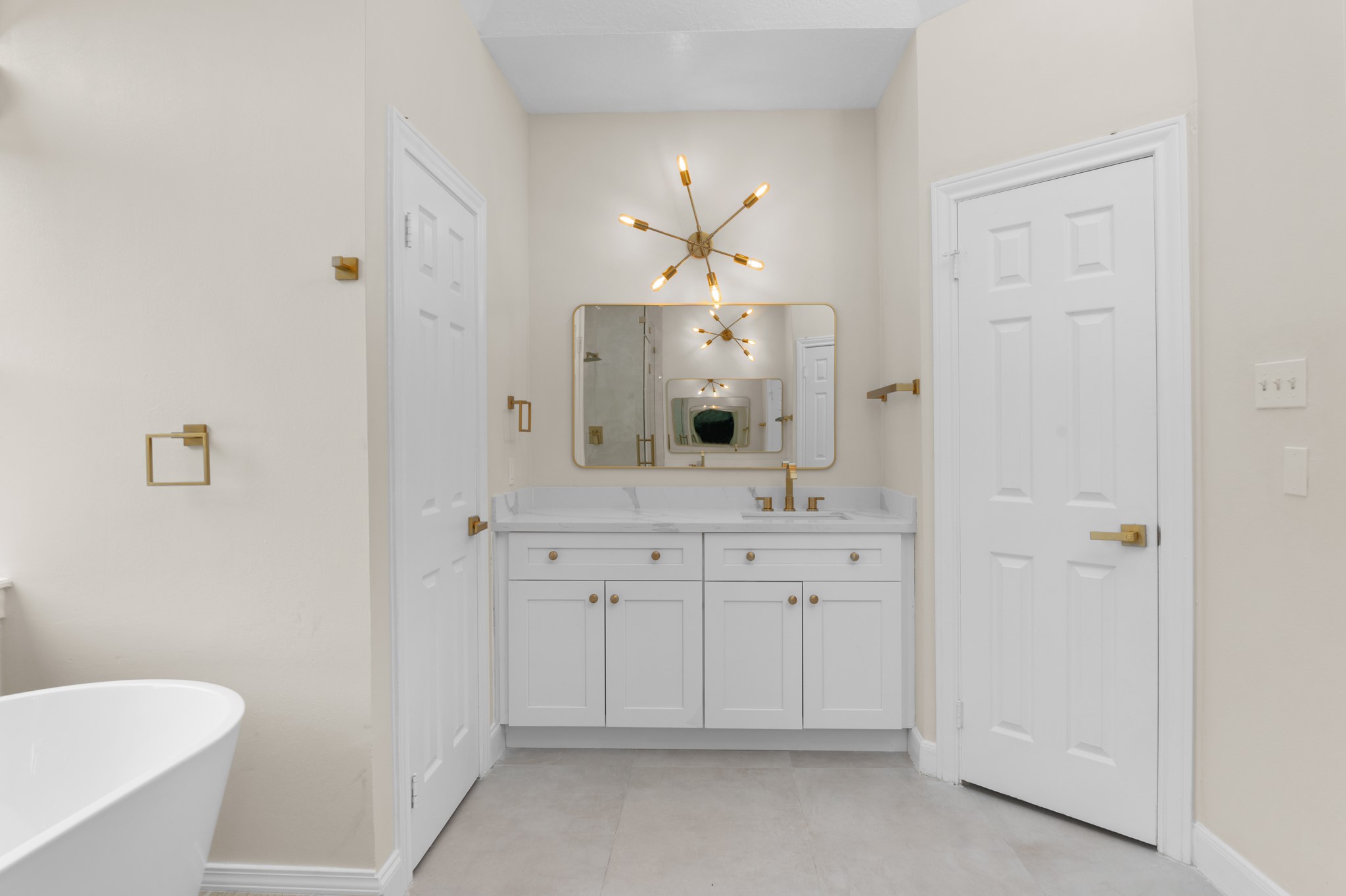 17402 Wilton Park Court Spring, TX 77379 - Photo 15 of 50 a bathroom with a sink and a mirror
