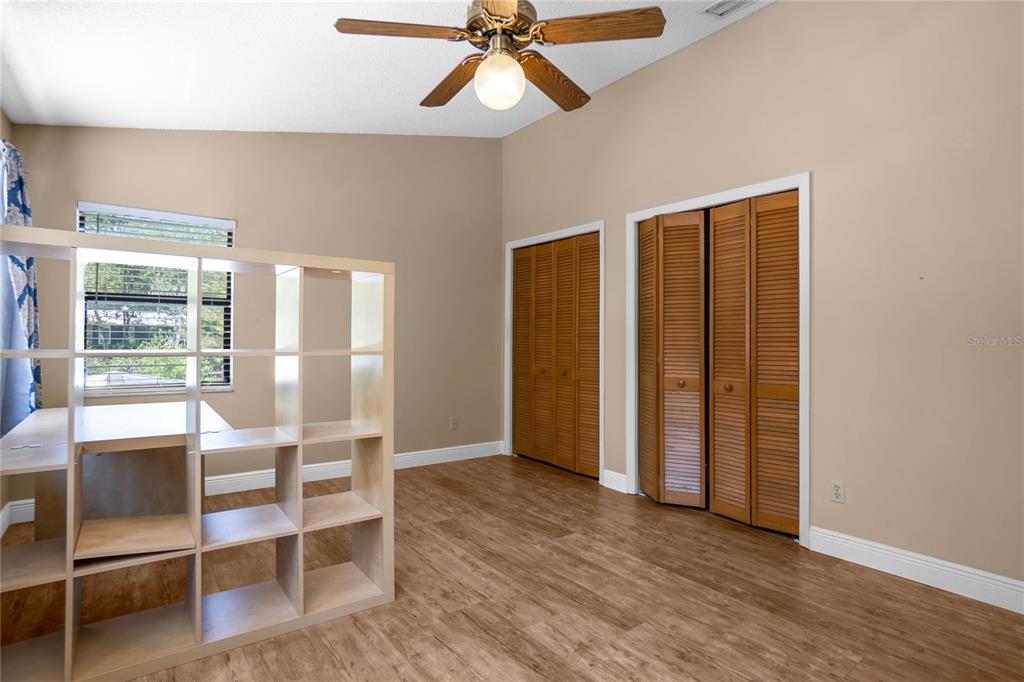 28330 Peterson Camp Road Brooksville, FL 34601 - Photo 25 of 60 a view of an empty room with a window
