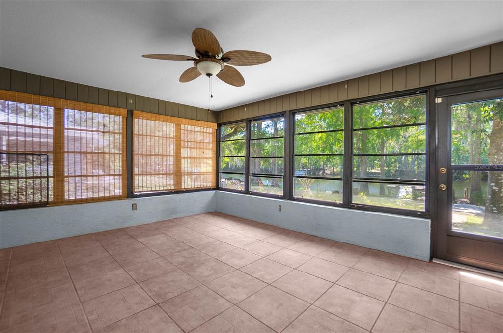 28330 Peterson Camp Road Brooksville, FL 34601 - Photo 30 of 60 a view of an empty room with a window