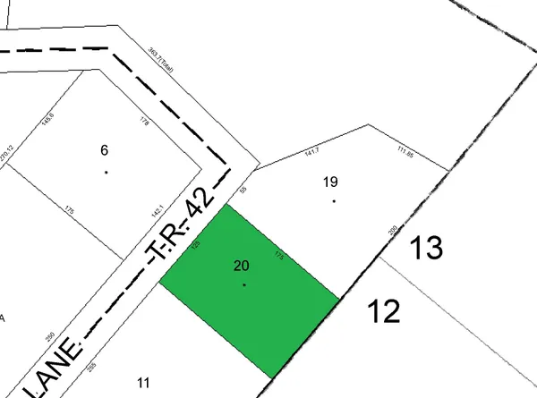 a view of a floor to ceiling window and a white house