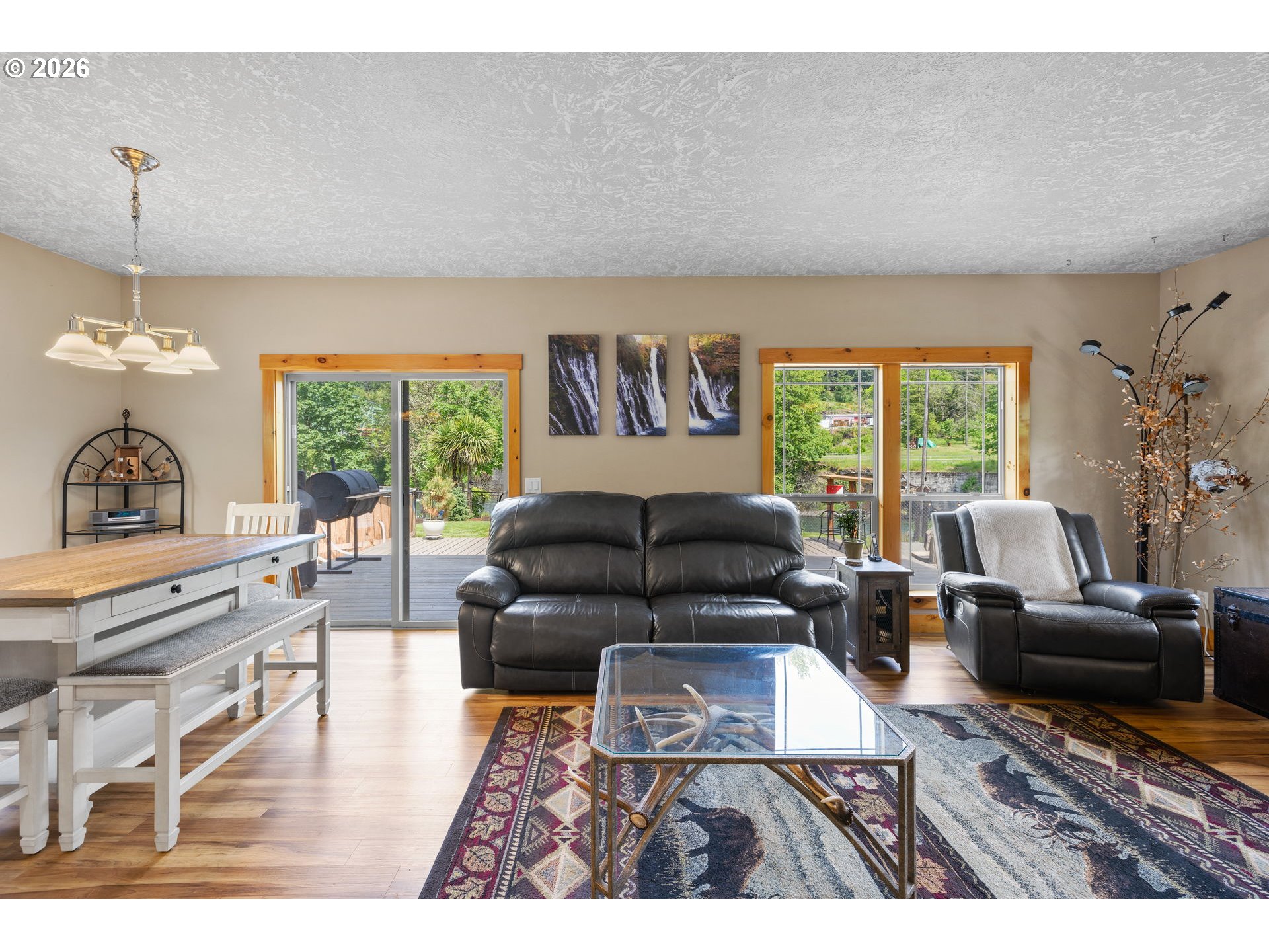 210 Southeast Whitten Road Mill City, OR 97360 - Photo 16 of 48 a living room with furniture and a large window