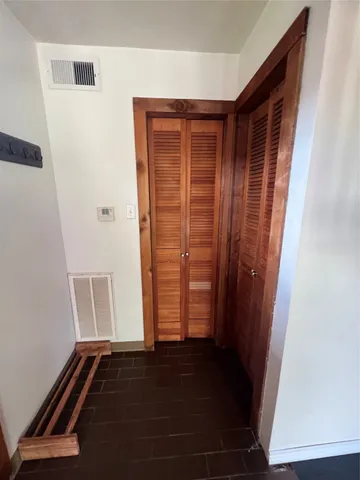 a room with furniture and a chandelier